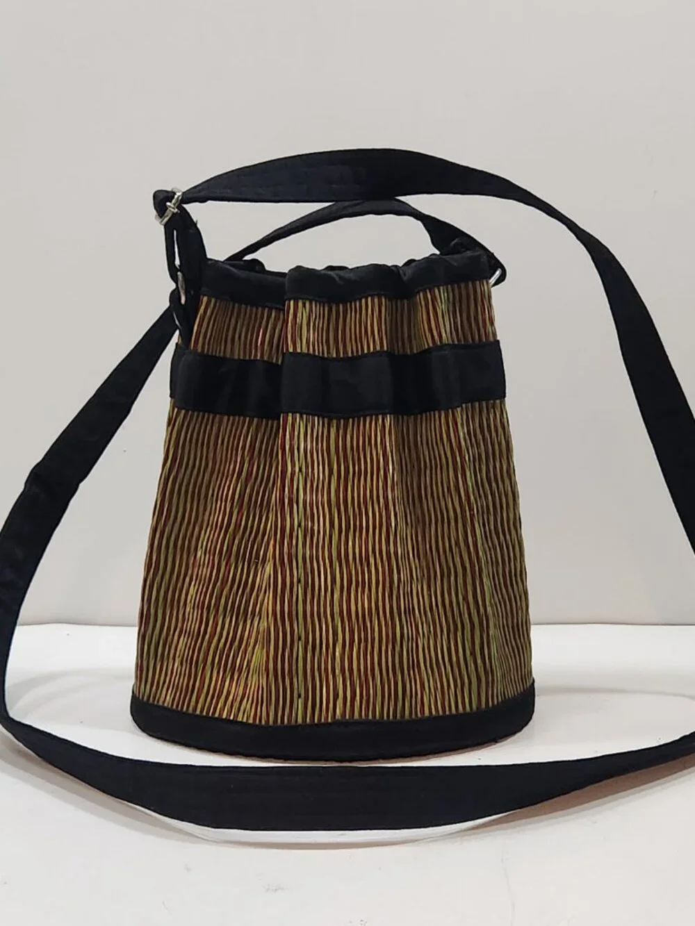 Saraye Tatami Woven Cinch Bucket Bag - Red & Green Grass Stripe